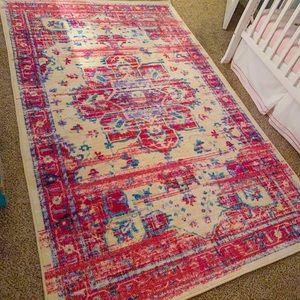 Pink area rug